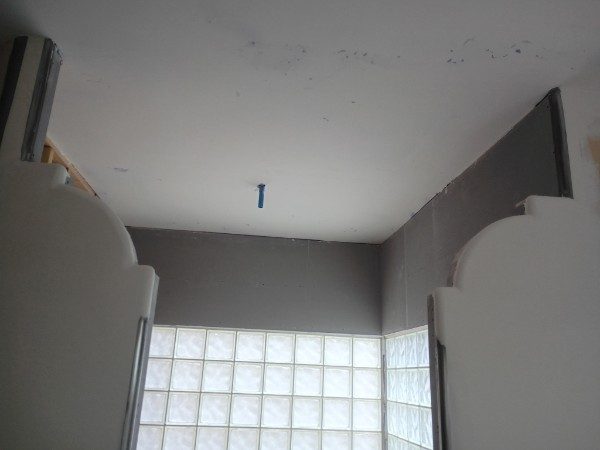 Bathroom ceiling and walls during a drywall remodel