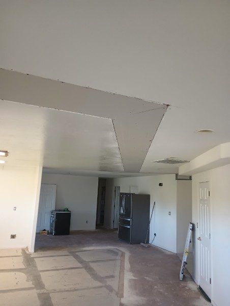 After: same ceiling repaired and taped